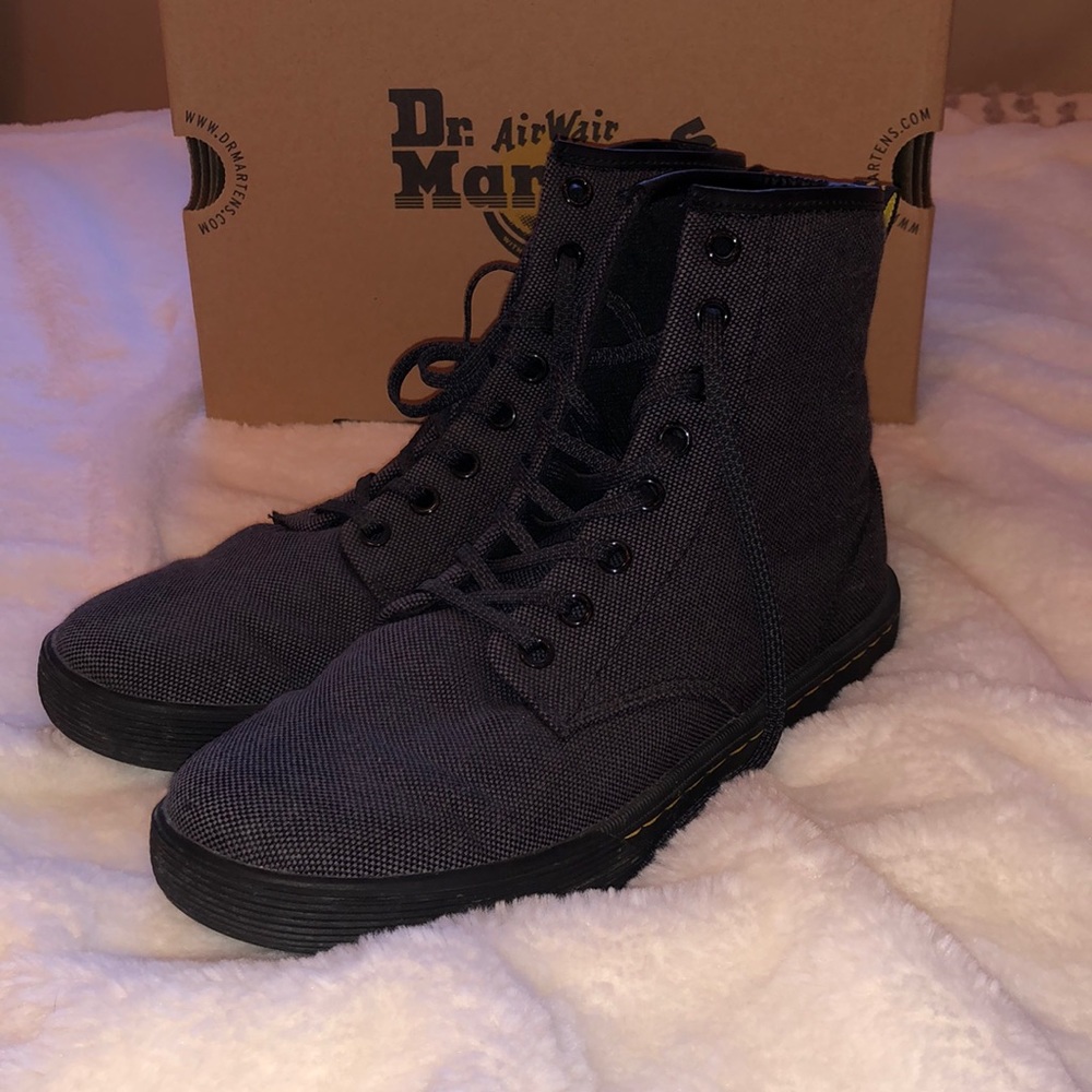 Gray and black woven textile doc martens